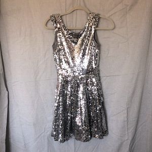 Short fun party dress, full silver sequins, zipper back.